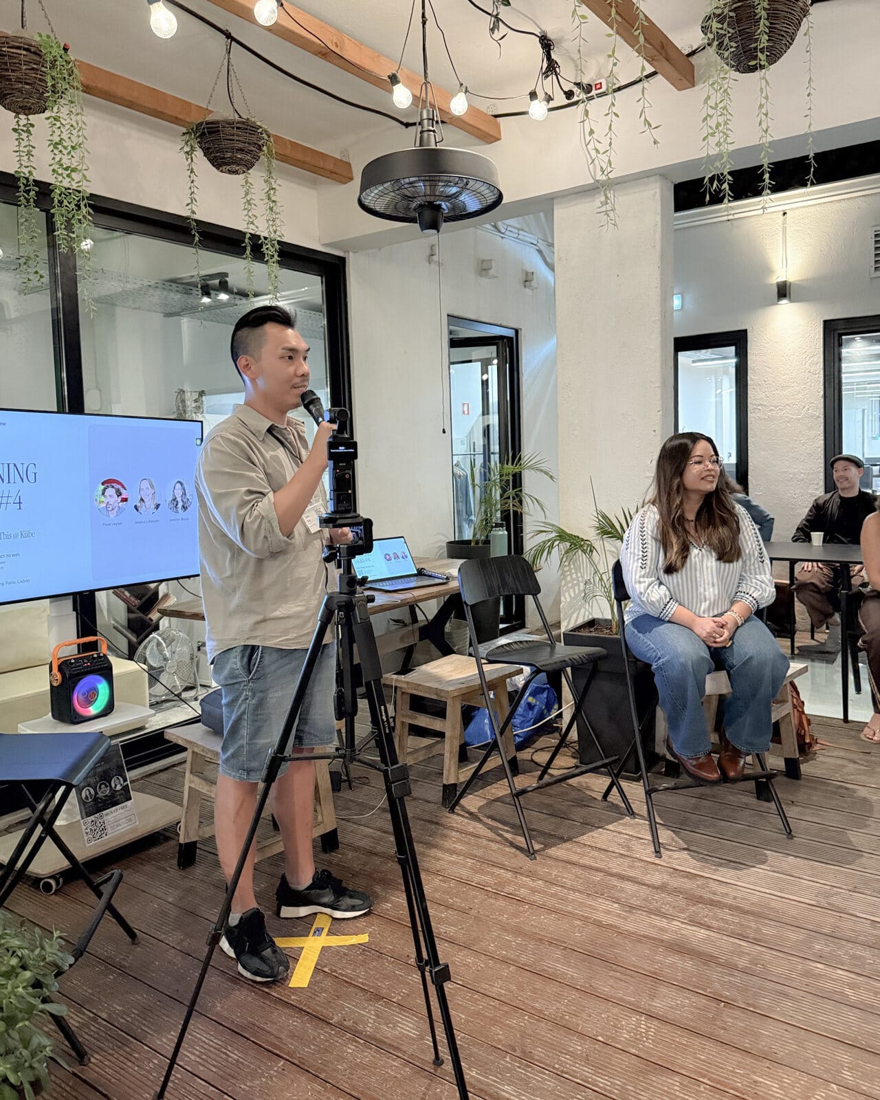 Van Vo hosting Lightning Talks #4 on the Kübe patio